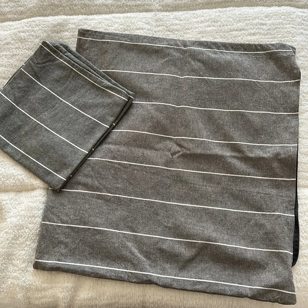 Two IKEA Mildrun pillow covers